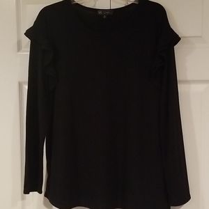 Black long sleeve top with ruffle accent